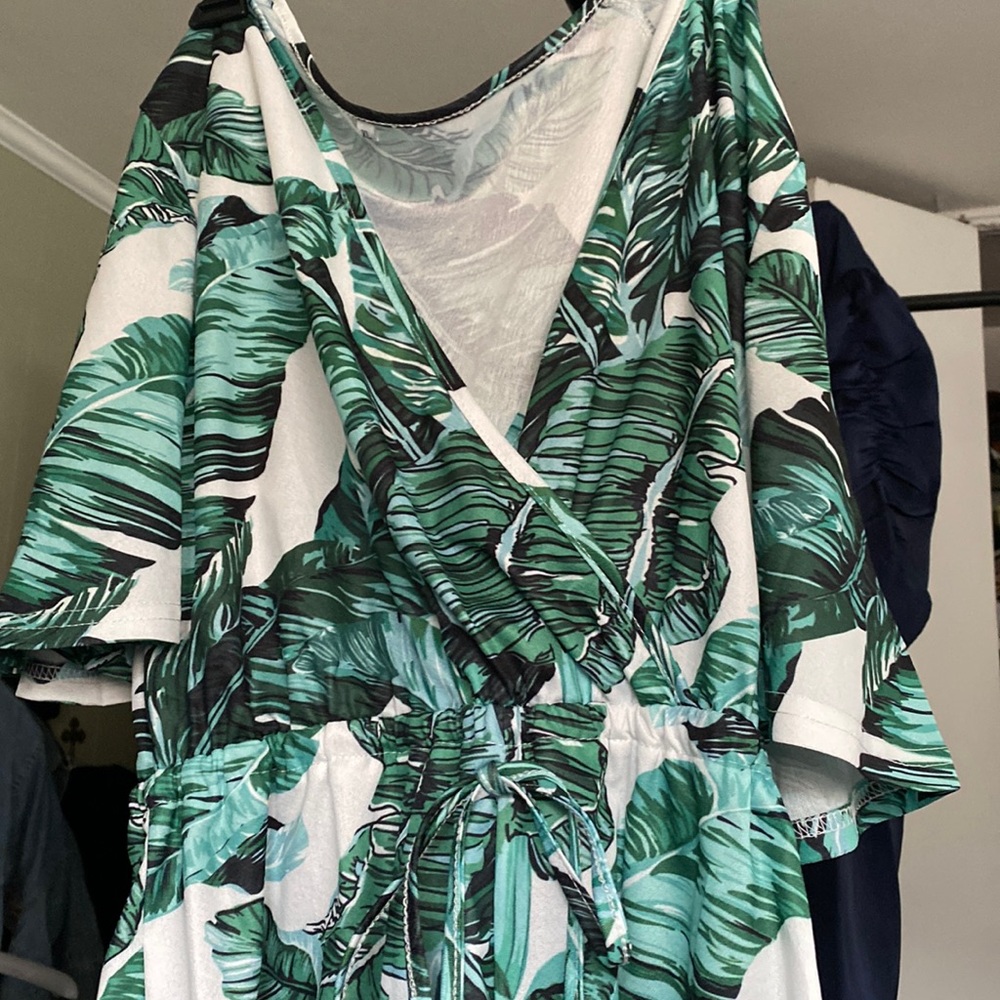 Brand new never worn palm tree one piece short!! Size XL